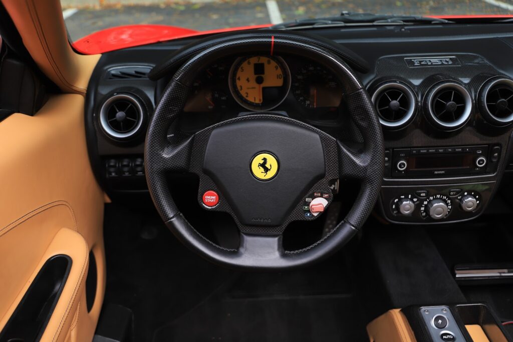 Ferrari F430 cockpit with steering wheel, manettino and F1 paddles